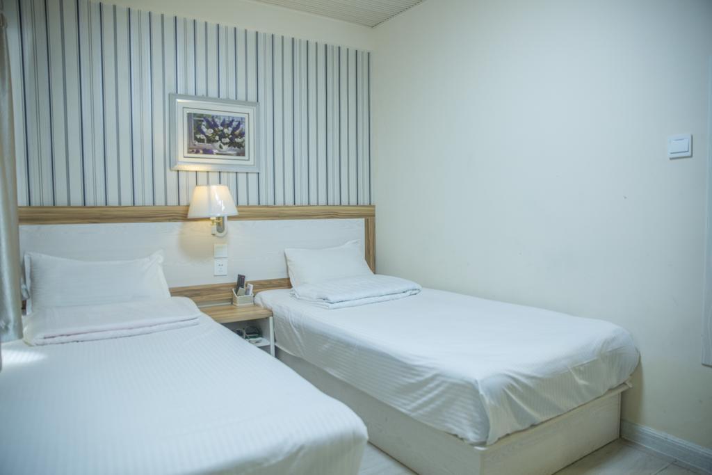 Qingdao Haibianke Hostel Kamer foto
