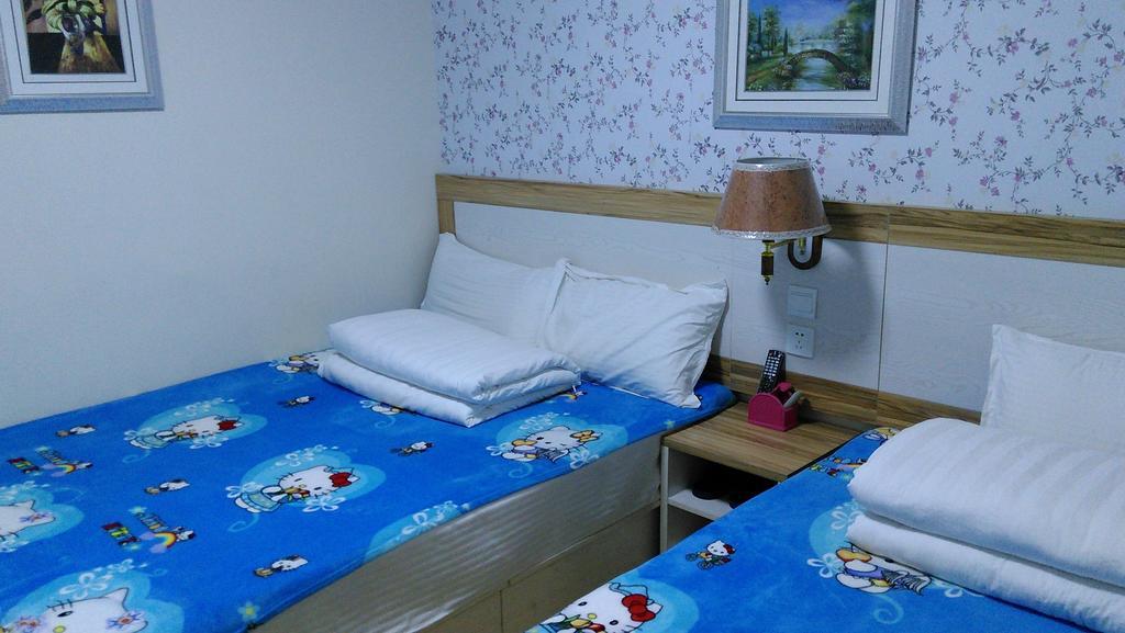 Qingdao Haibianke Hostel Kamer foto