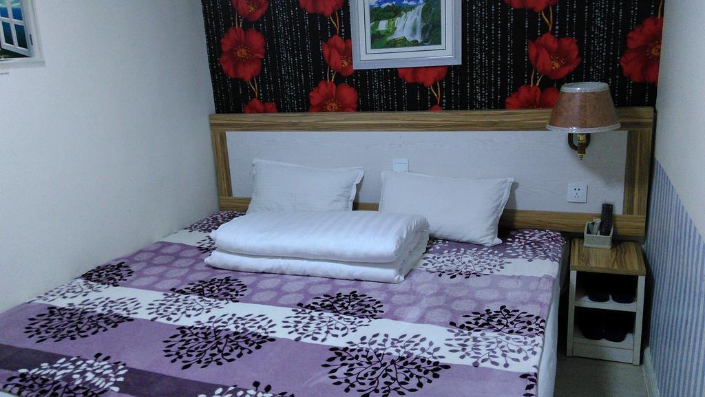 Qingdao Haibianke Hostel Kamer foto
